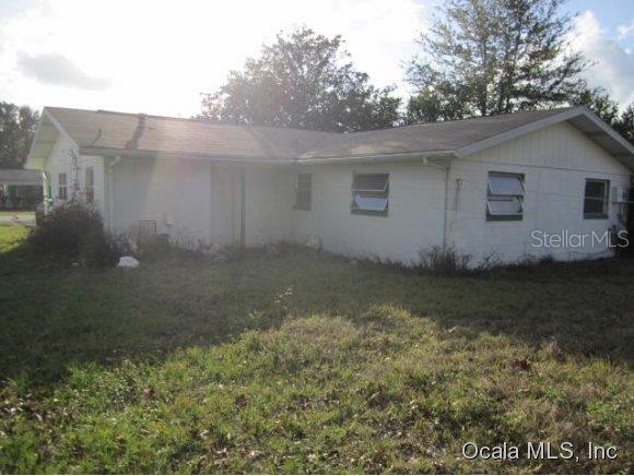 466 Spring Lane Ocala, FL 34472 - Photo 1 of 1 a view of a backyard