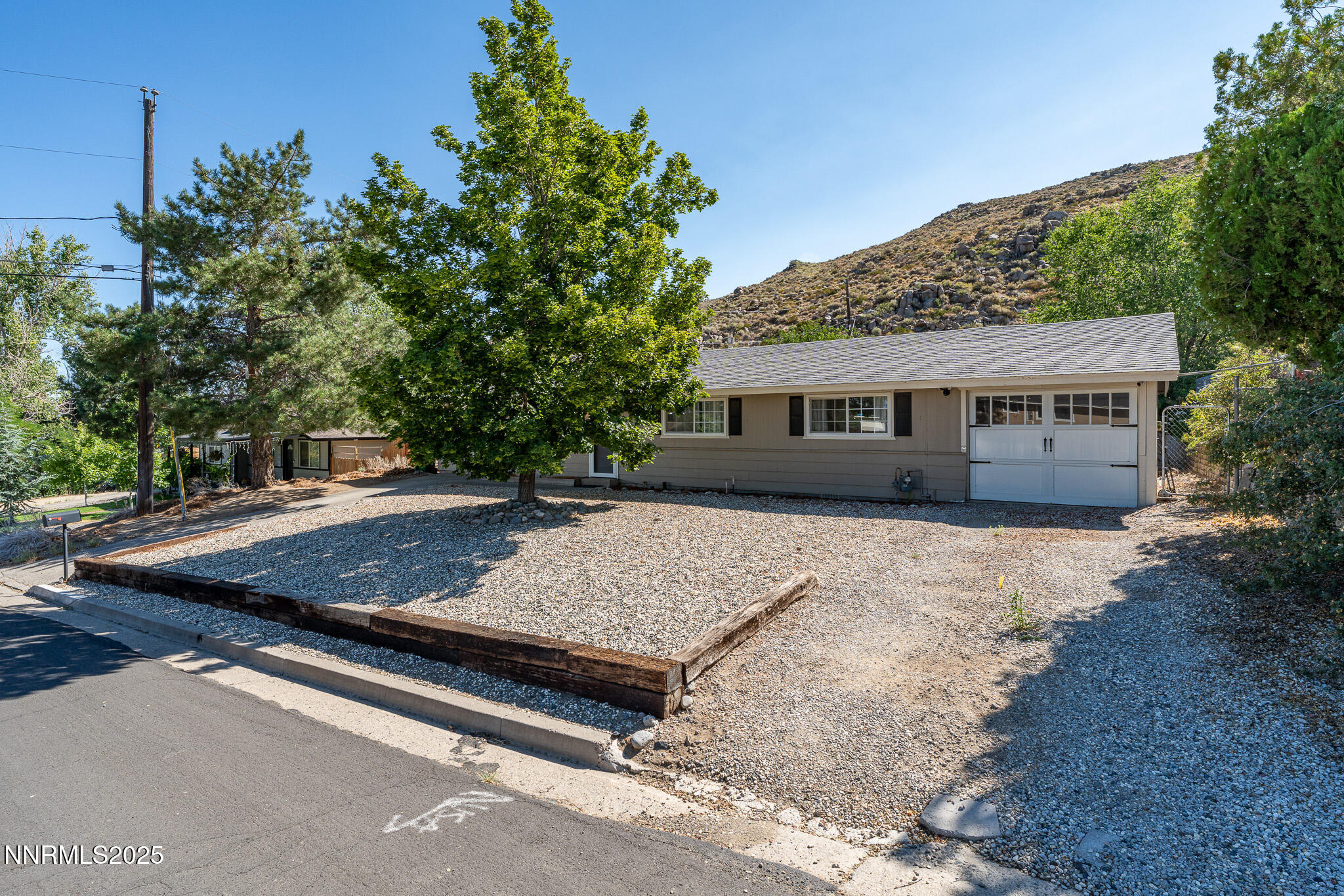 295 Palace Drive Reno, NV 89506 - Photo 22 of 26 a view of a house with a yard