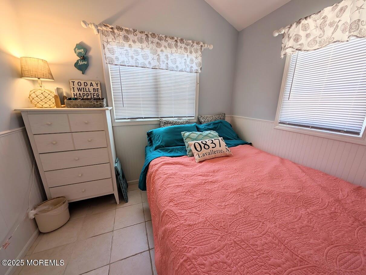 31 East Cormorant Way Lavallette, NJ 08735 - Photo 17 of 22 a bedroom with a bed and a window