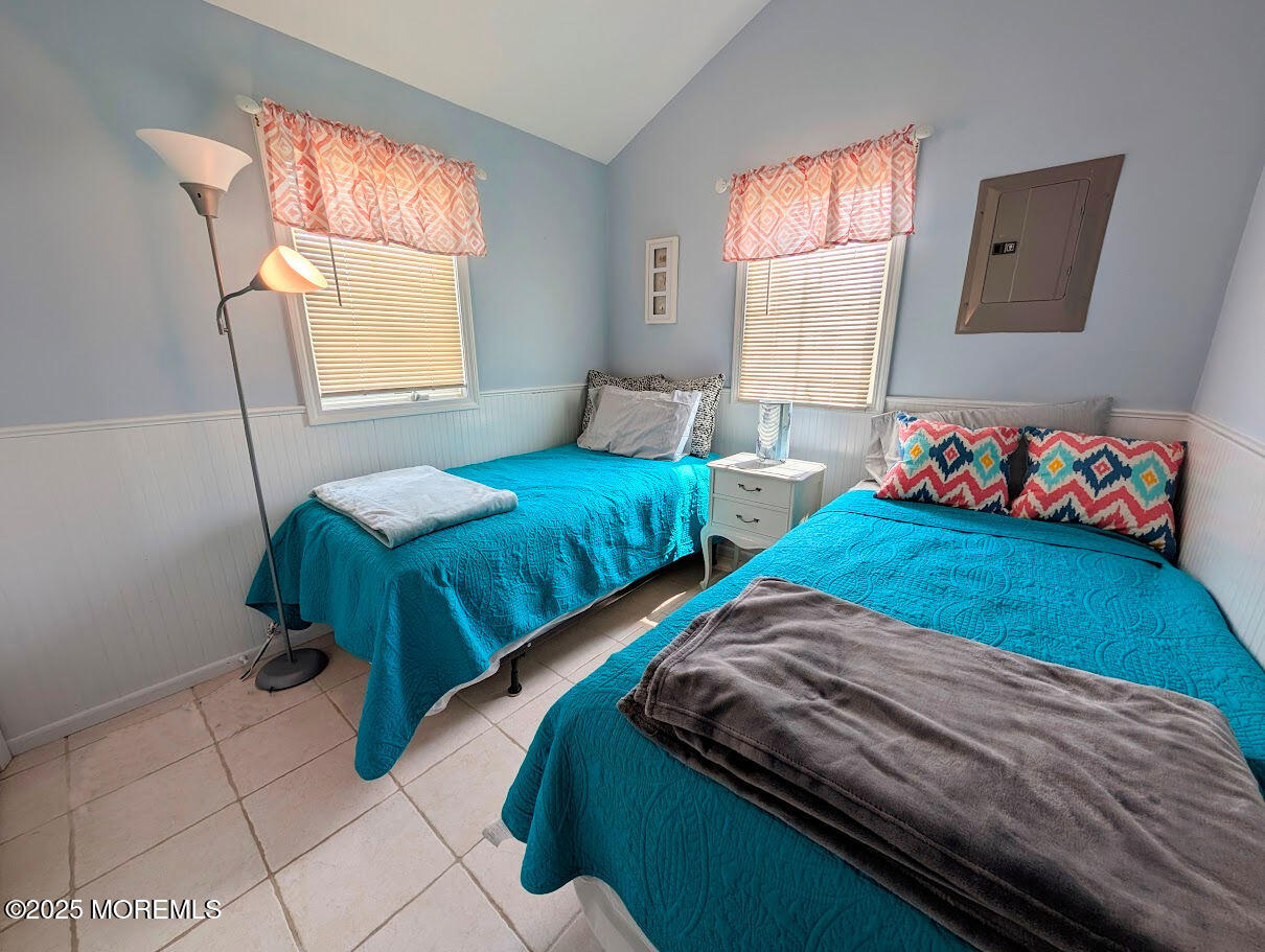 31 East Cormorant Way Lavallette, NJ 08735 - Photo 19 of 22 a bedroom with two beds and a window