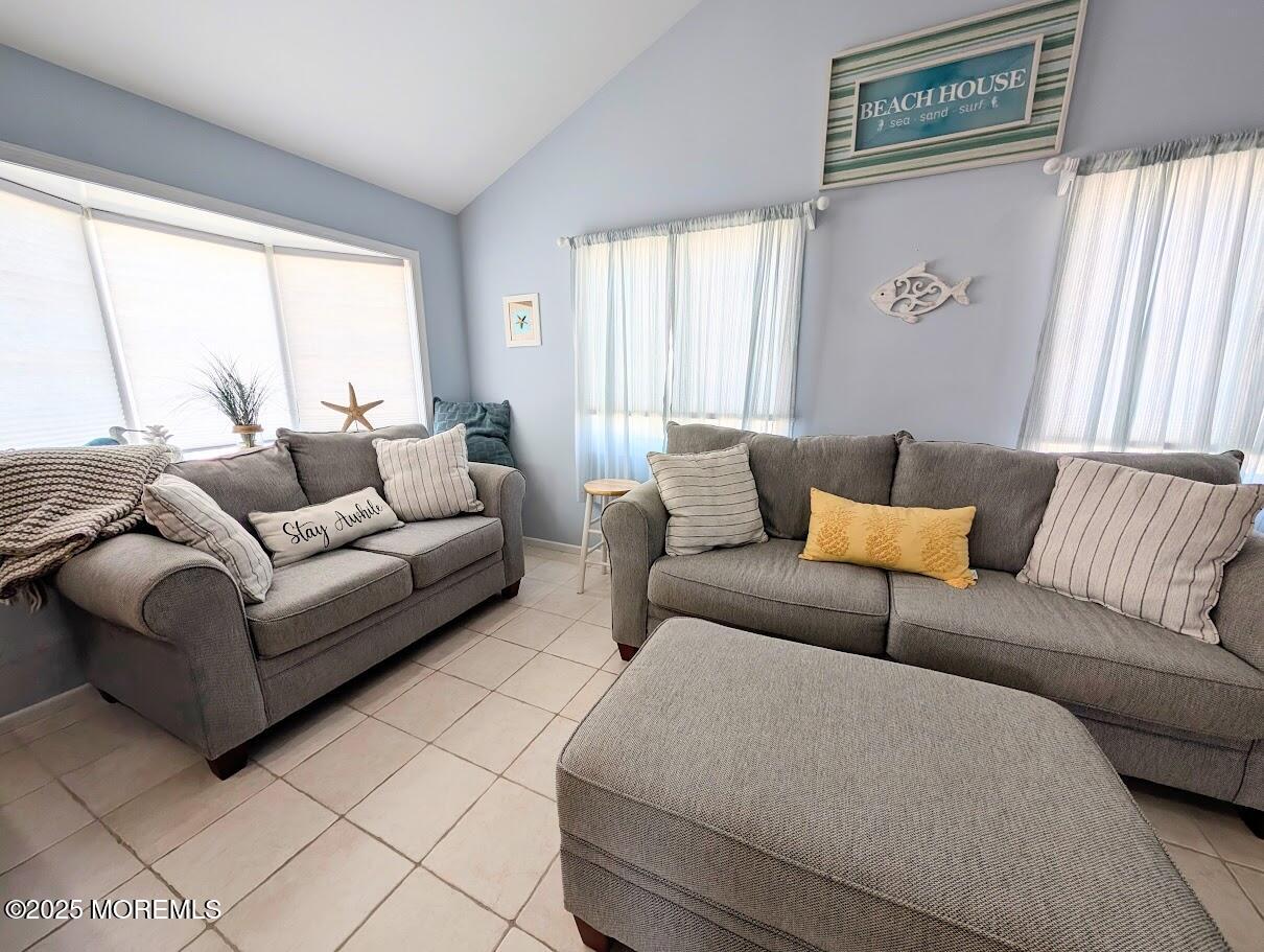 31 East Cormorant Way Lavallette, NJ 08735 - Photo 2 of 22 a living room with furniture and a large window