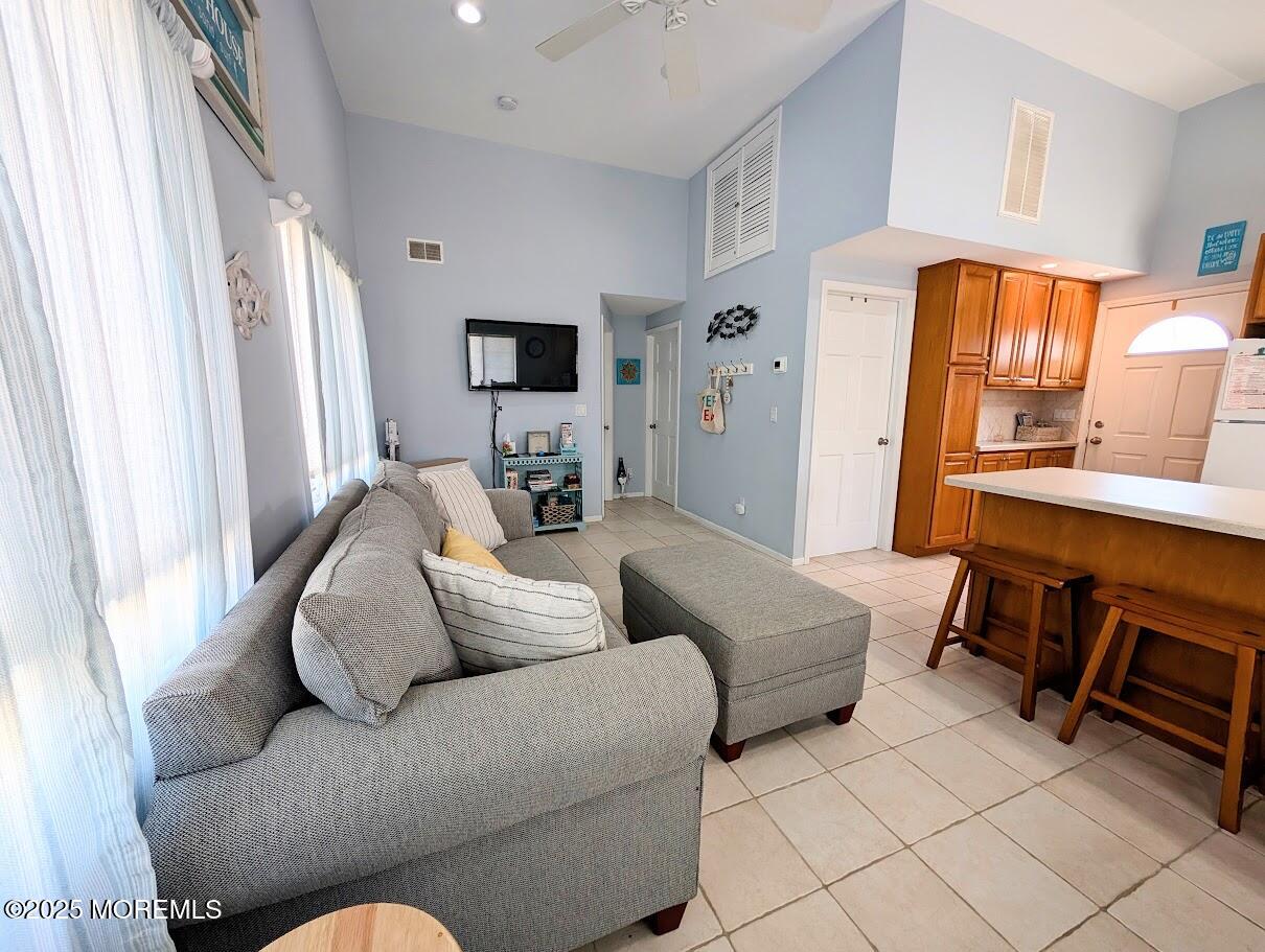 31 East Cormorant Way Lavallette, NJ 08735 - Photo 5 of 22 a living room with furniture and a window