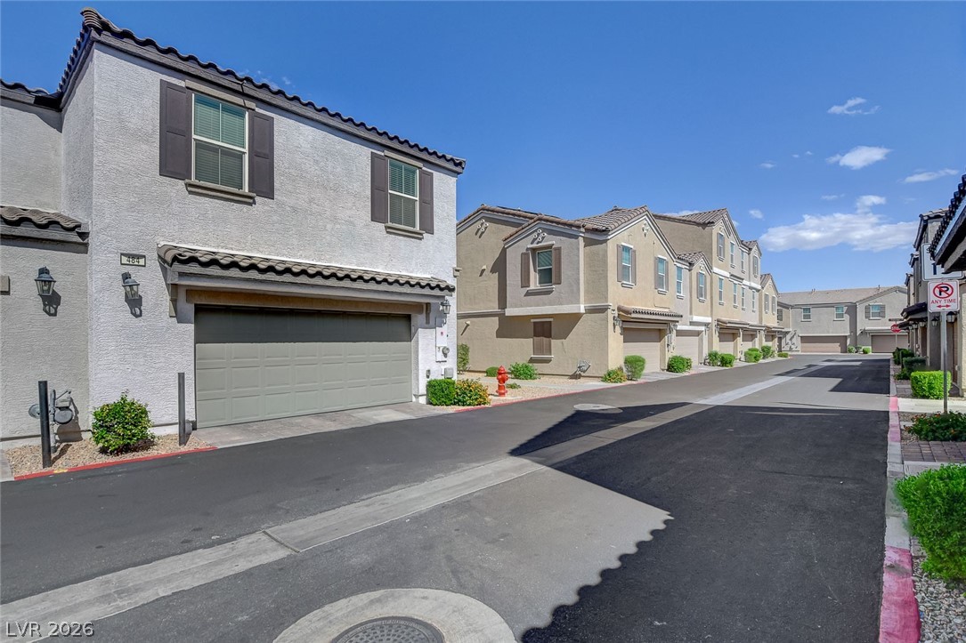 484 Filaree Place Henderson, NV 89015 - Photo 58 of 71 This charming residence offers comfortable living with convenient attached garage access.