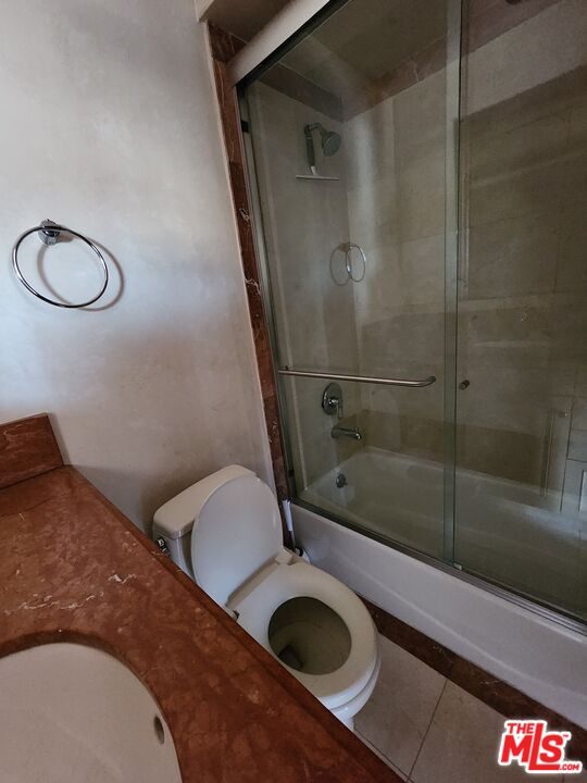 Almayo Avenue Los Angeles, CA 90064 - Photo 26 of 35 a bathroom with a sink and a shower