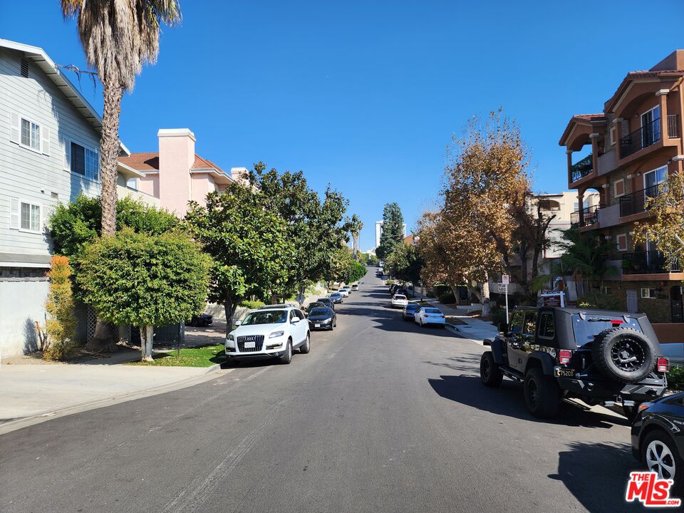 Almayo Avenue Los Angeles, CA 90064 - Photo 29 of 35 a car parked on the side of a street