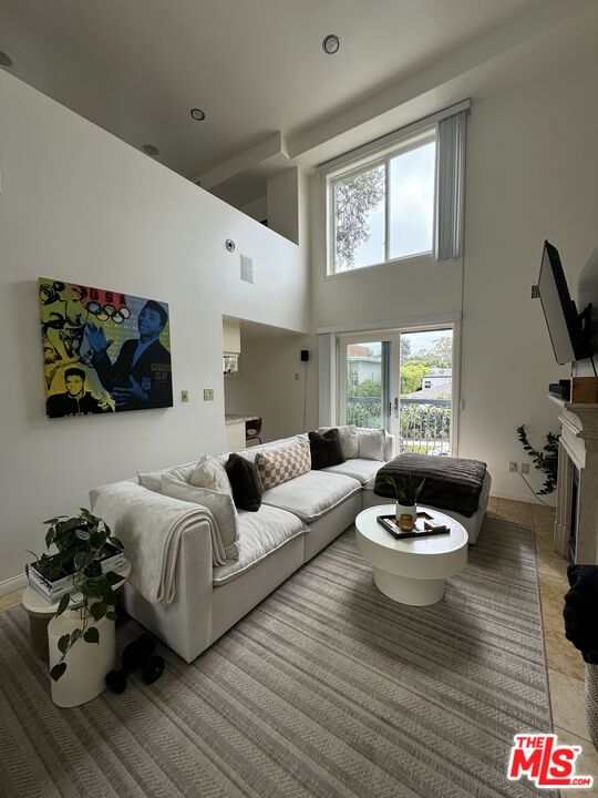 Almayo Avenue Los Angeles, CA 90064 - Photo 4 of 35 a living room with furniture and a wooden floor
