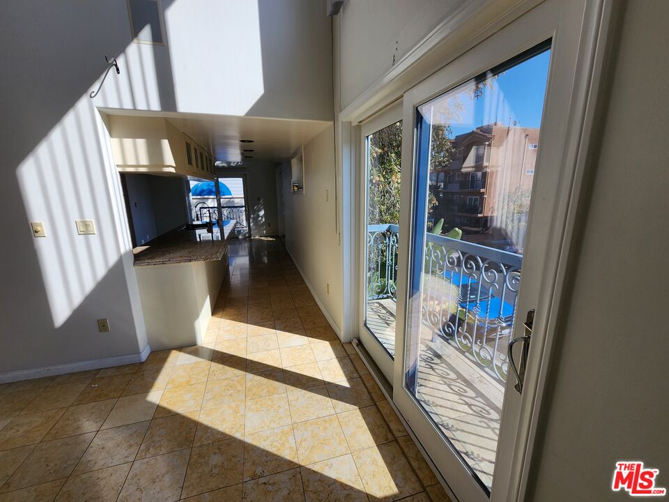 Almayo Avenue Los Angeles, CA 90064 - Photo 9 of 35 a view of living room with furniture and a fireplace