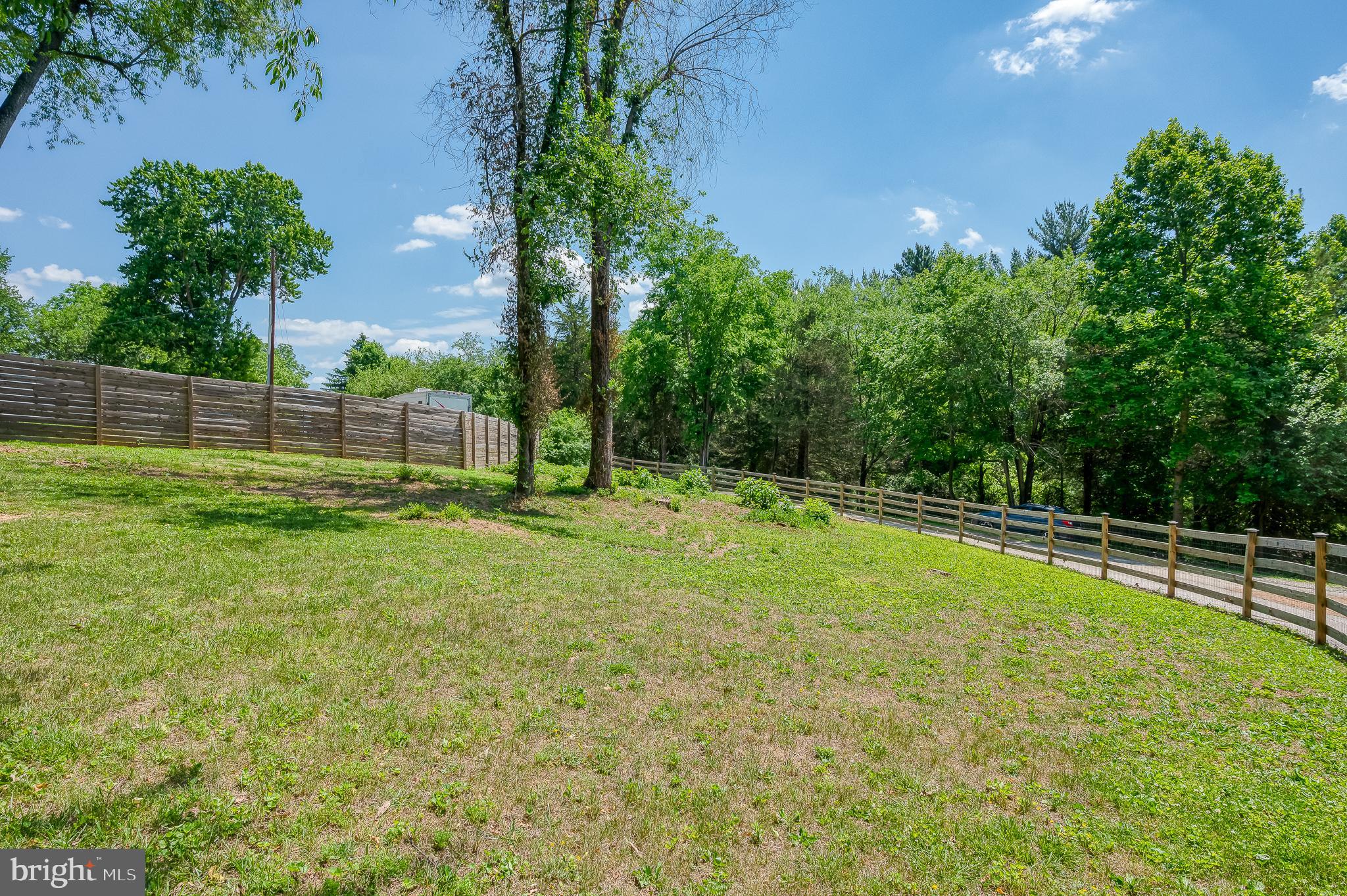 305 Crowl Road Westminster, MD 21158 - Photo 51 of 55 a view of a backyard with a small cabin