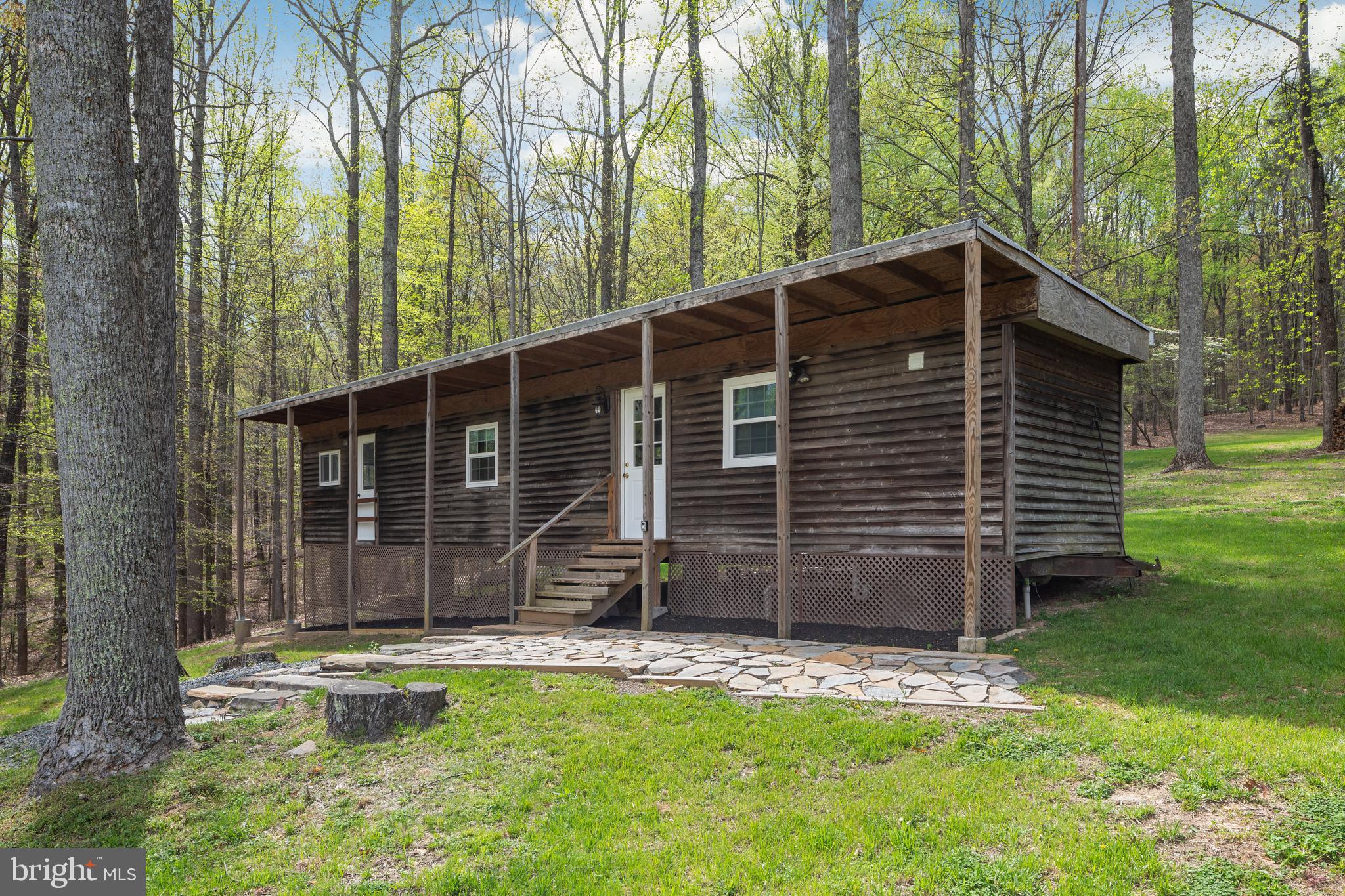 4518 Highpoint Lane The Plains, VA 20198 - Photo 1 of 4 a view of backyard with a garden and large trees