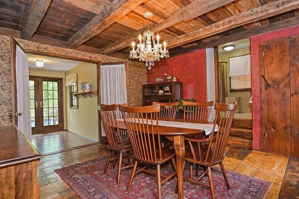 81 Warren Road Brimfield, MA 01010 - Photo 15 of 42 a dining room with furniture a chandelier and window