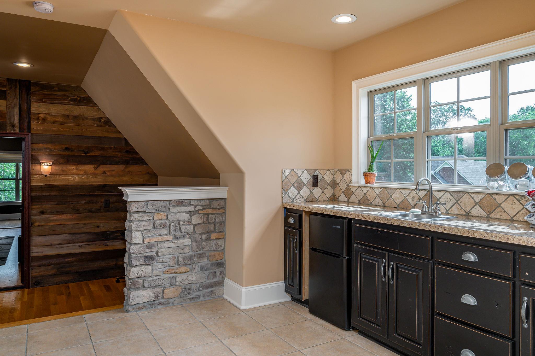105 Rockingham Drive Murfreesboro, TN 37129 - Photo 23 of 30 a bathroom with a granite countertop sink and a mirror