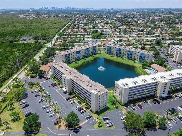an aerial view of a city with lots of residential buildings