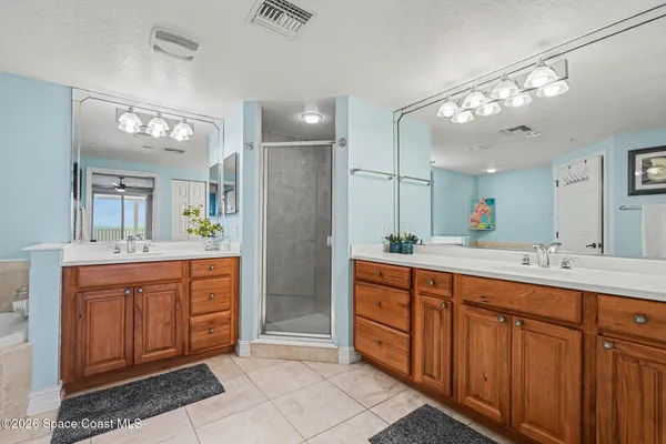 a bathroom with a sink a vanity and a mirror