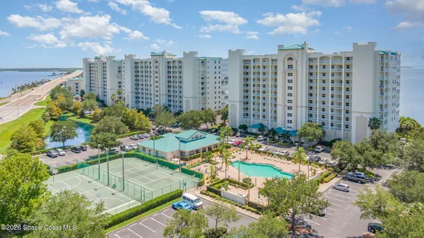 a view of swimming pool with outdoor seating