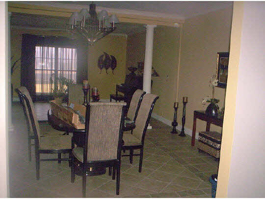 1841 Ashton Road Ashton, IL 61006 - Photo 3 of 11 a view of a dining room with furniture and window