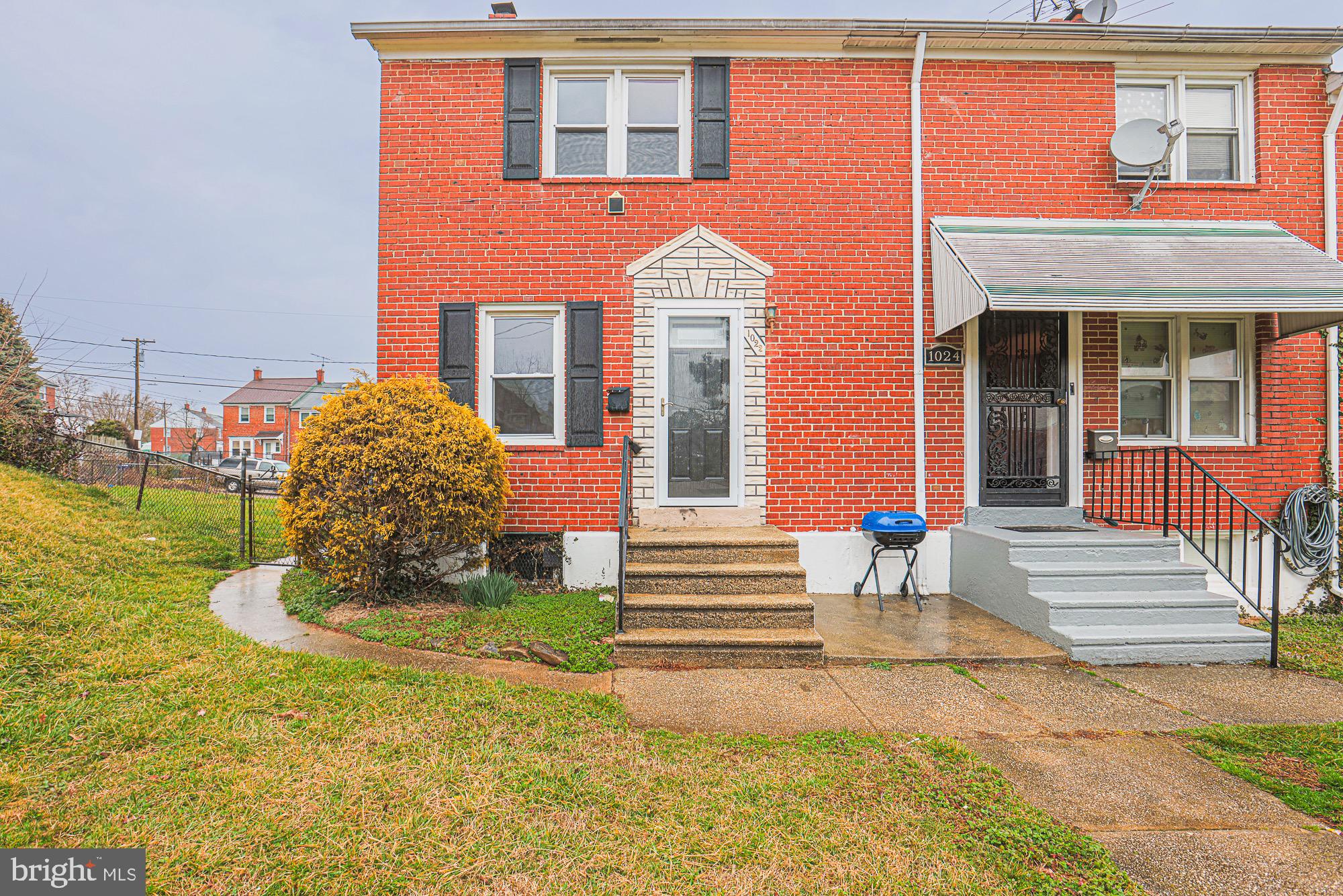 1022 Cameron Road Baltimore, MD 21212 - Photo 1 of 21 a front view of a house