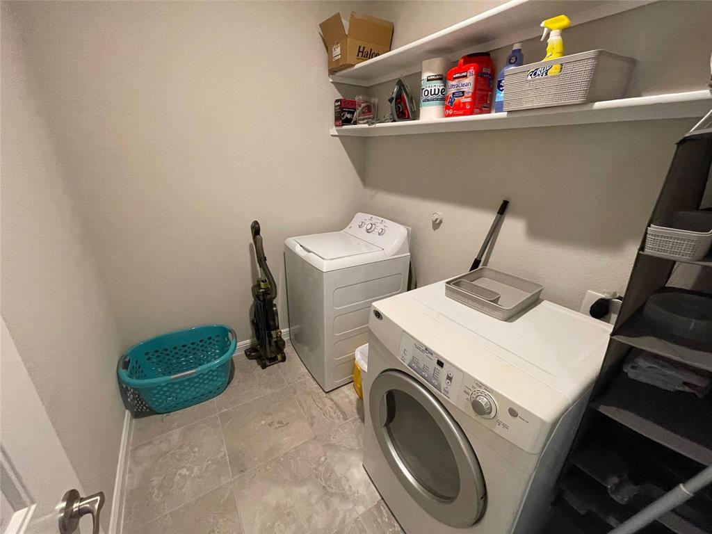 1904 Cardinal Way Argyle, TX 76226 - Photo 14 of 17 a utility room with dryer and washer