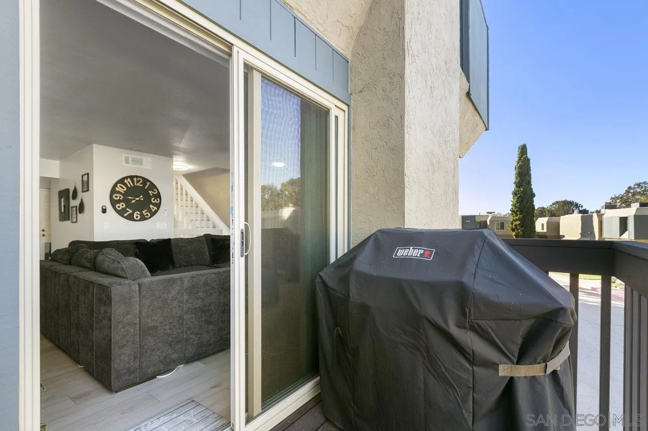 6381 Rancho Mission Road, Unit 6 San Diego, CA 92108 - Photo 14 of 30 a view of living room and kitchen with furniture