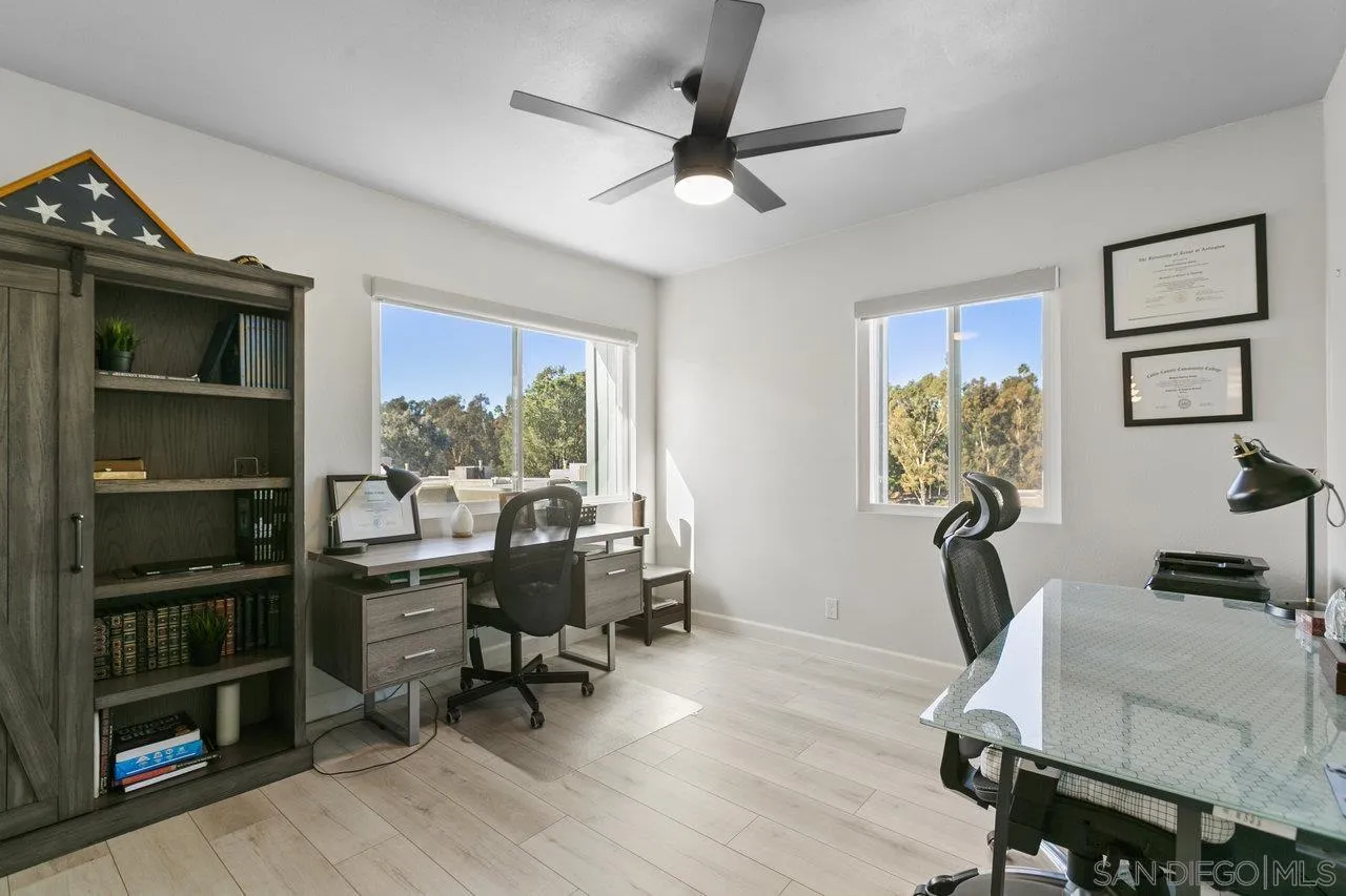 6381 Rancho Mission Road, Unit 6 San Diego, CA 92108 - Photo 17 of 30 a view of a workspace with furniture and a window