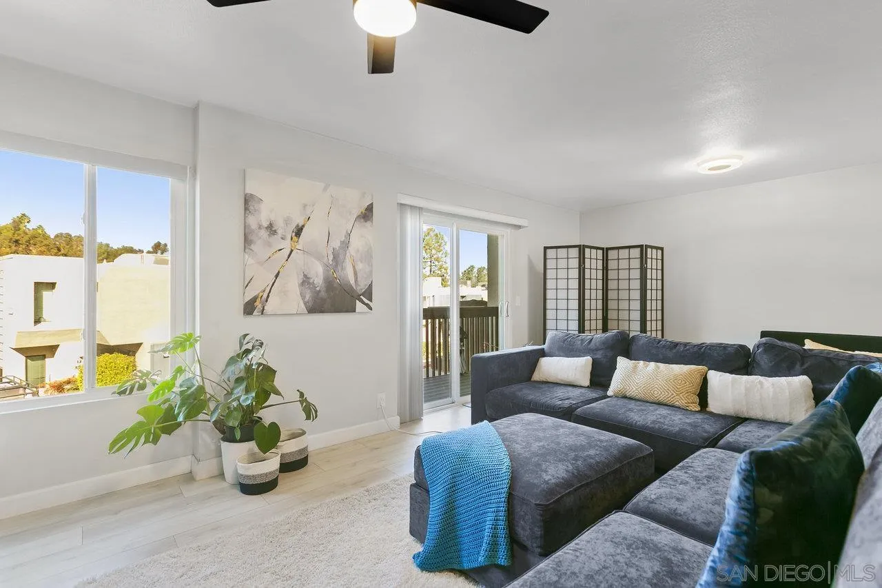 6381 Rancho Mission Road, Unit 6 San Diego, CA 92108 - Photo 4 of 30 a living room with furniture and painting on the wall