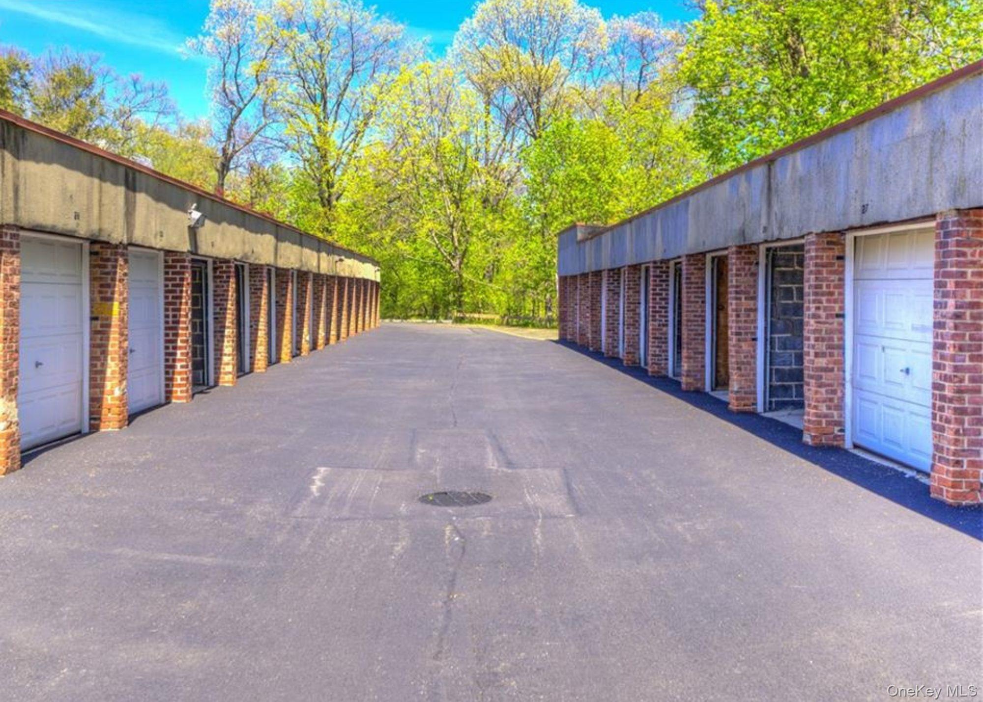60 Pinewood Road, Unit 1B Hartsdale, NY 10530 - Photo 18 of 27 Garage and ample unassigned parking.