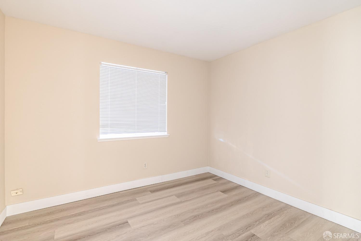 4603 Chelsea Drive Oakley, CA 94561 - Photo 27 of 36 a view of an empty room with wooden floor and a window