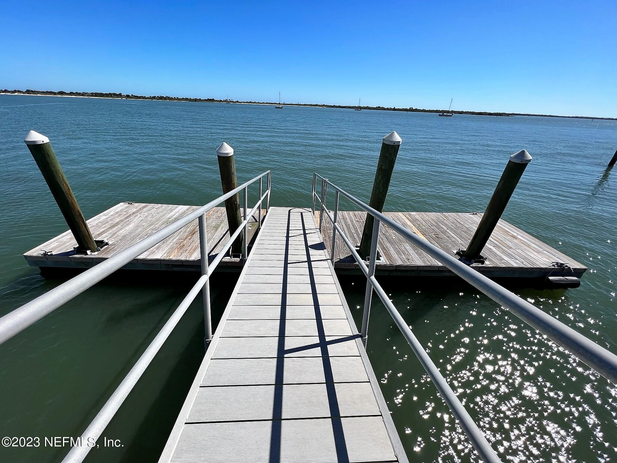 111 Inlet Drive St. Augustine, FL 32080 - Photo 6 of 11 a view of a balcony with chairs