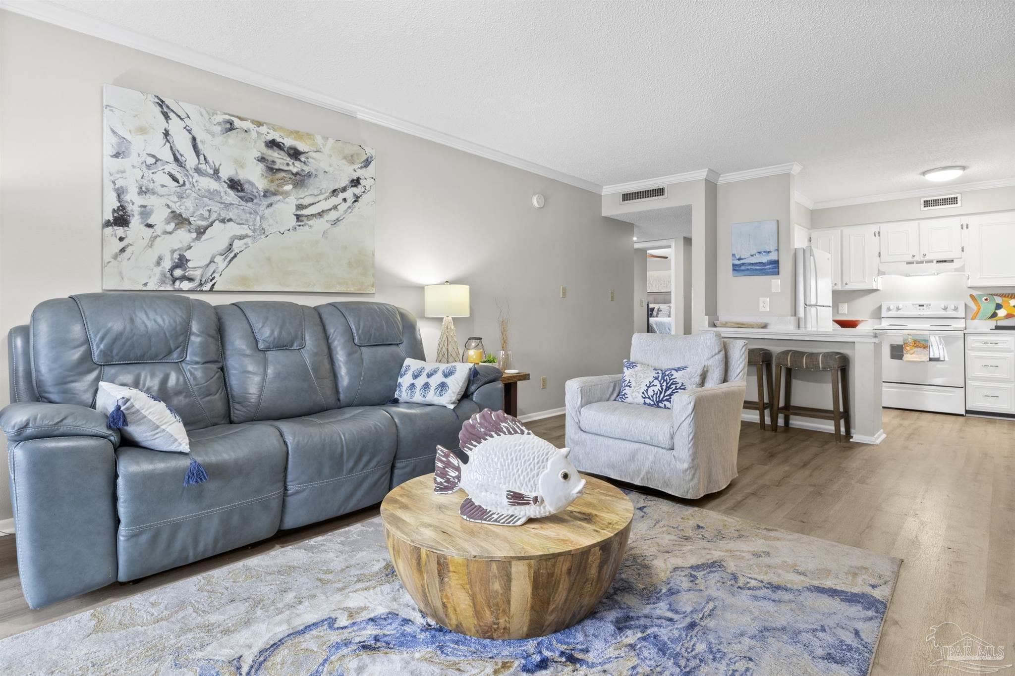 16470 Perdido Key Drive, Unit C24 Perdido Key, FL 32507 - Photo 16 of 48 a living room with furniture and a couch