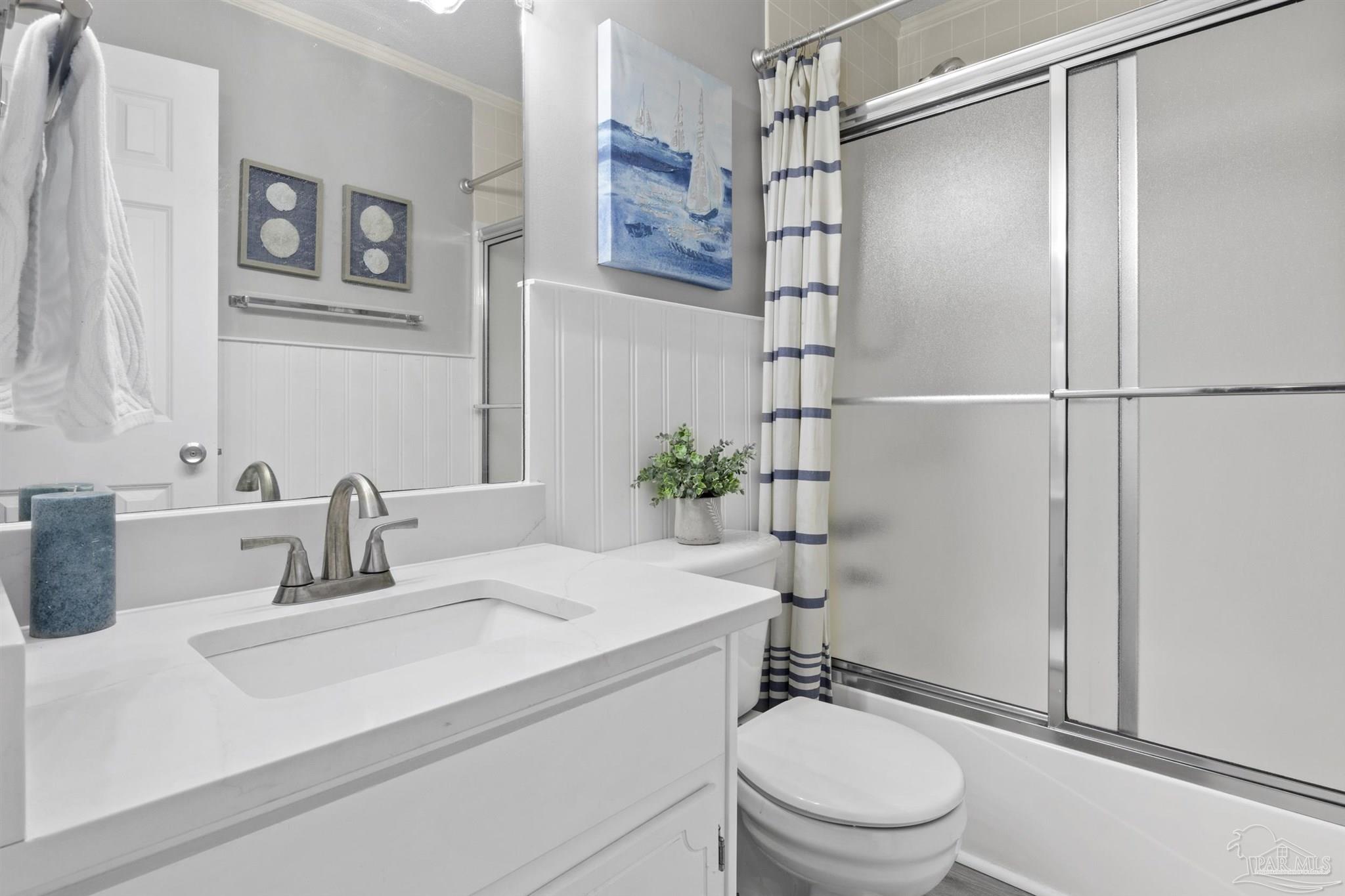 16470 Perdido Key Drive, Unit C24 Perdido Key, FL 32507 - Photo 23 of 48 a bathroom with a sink toilet and shower