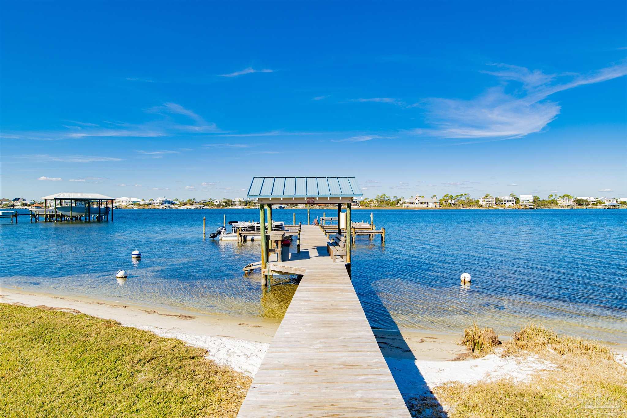 16470 Perdido Key Drive, Unit C24 Perdido Key, FL 32507 - Photo 25 of 48 a view of a swimming pool and an ocean