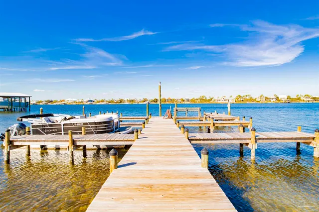 a view of a chairs and tables in the patio