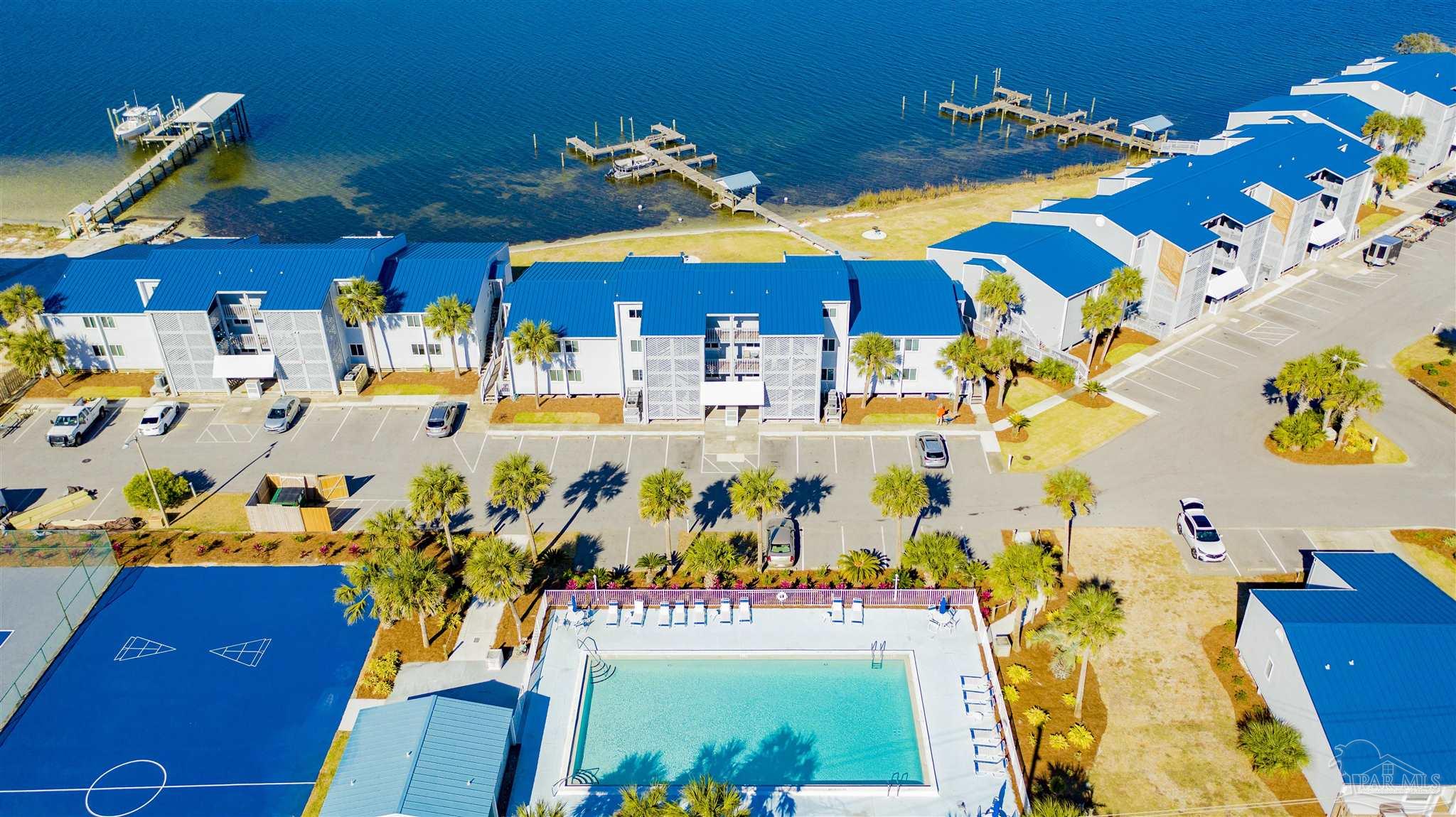 16470 Perdido Key Drive, Unit C24 Perdido Key, FL 32507 - Photo 3 of 48 a view of a room with toys and couches