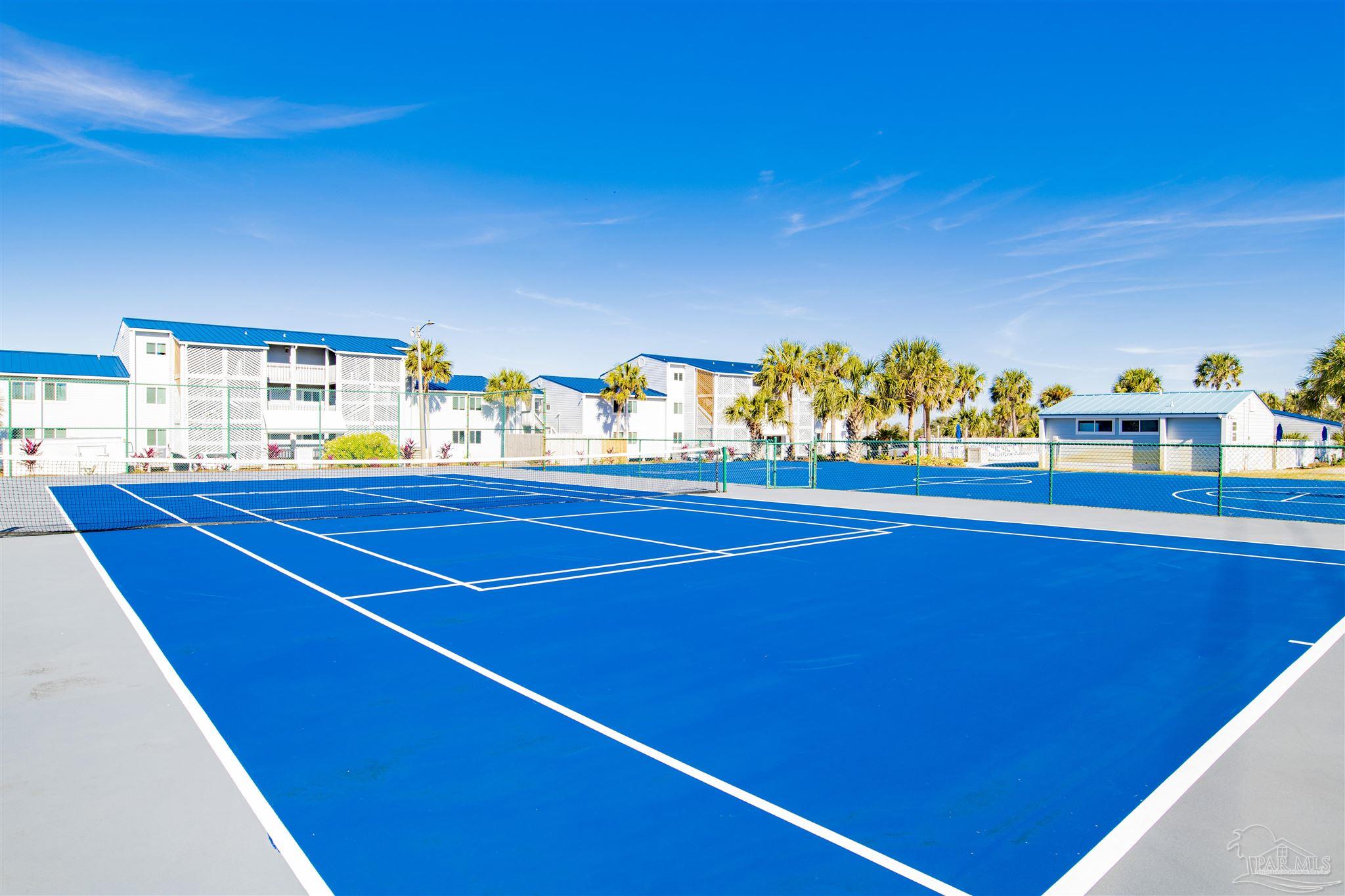 16470 Perdido Key Drive, Unit C24 Perdido Key, FL 32507 - Photo 46 of 48 a room with lots of trees and retail shops