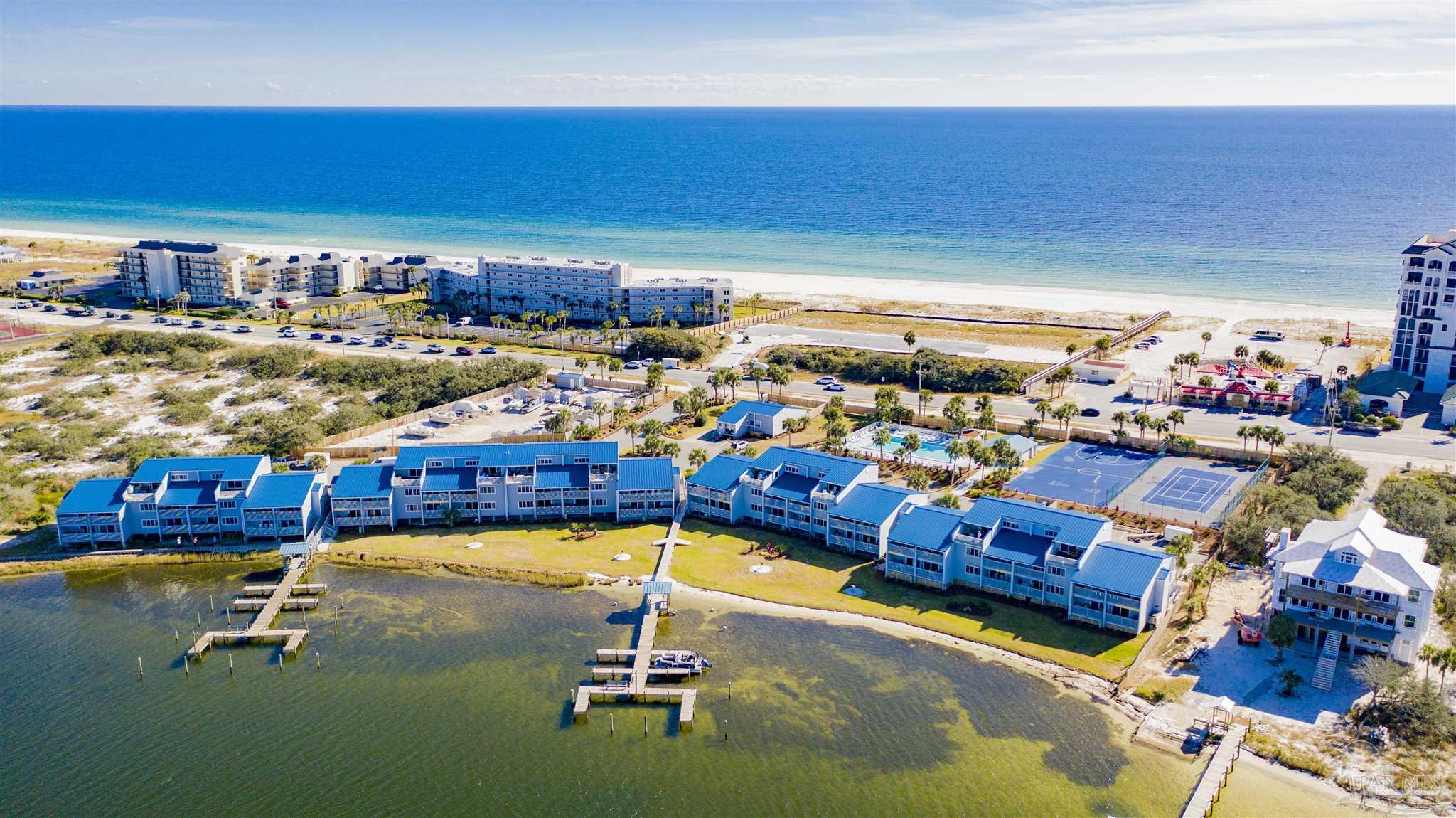 16470 Perdido Key Drive, Unit C24 Perdido Key, FL 32507 - Photo 48 of 48 a room with lots of wooden furniture