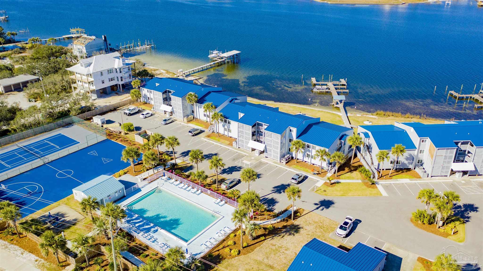 16470 Perdido Key Drive, Unit C24 Perdido Key, FL 32507 - Photo 8 of 48 an aerial view of a house a yard swimming pool and outdoor space