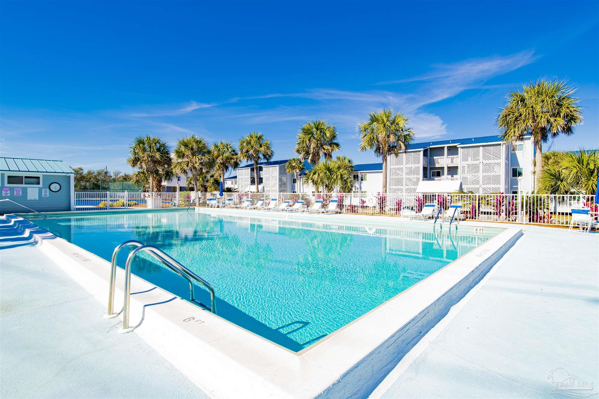 16470 Perdido Key Drive, Unit C24 Perdido Key, FL 32507 - Photo 9 of 48 a view of a swimming pool with an outdoor seating