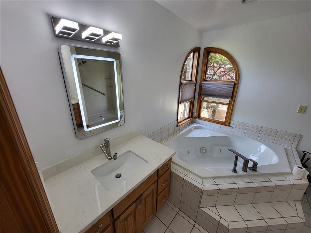 56 Lanik Road Bentleyville, PA 15314 - Photo 33 of 50 a bathroom with a sink and a mirror