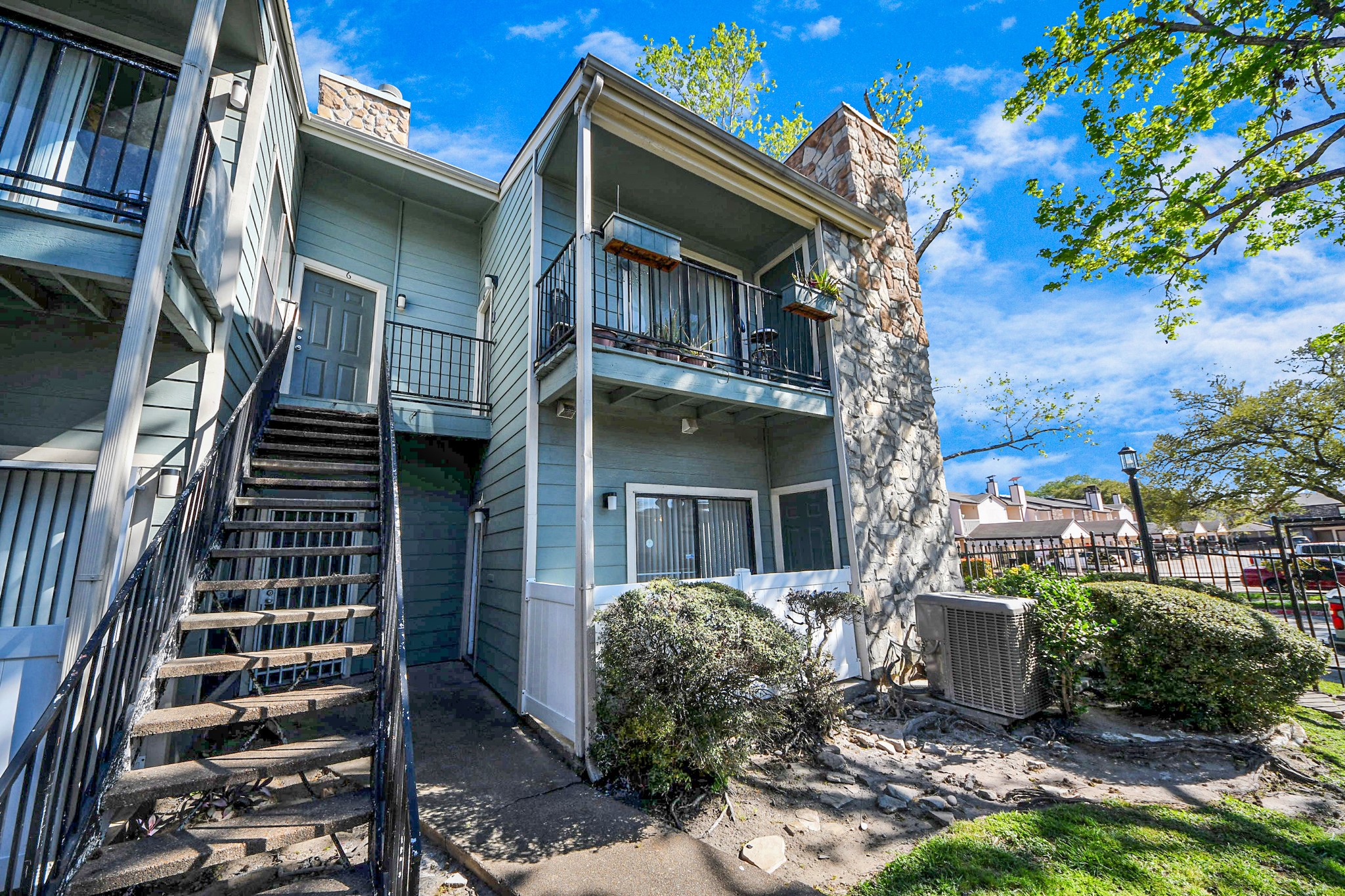 3750 Tanglewilde Street, Unit A7 Houston, TX 77063 - Photo 4 of 41 a view of a house with a yard