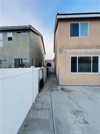 a view of a house with a sink and furniture