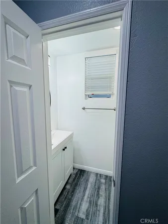 a bathroom with a sink and vanity