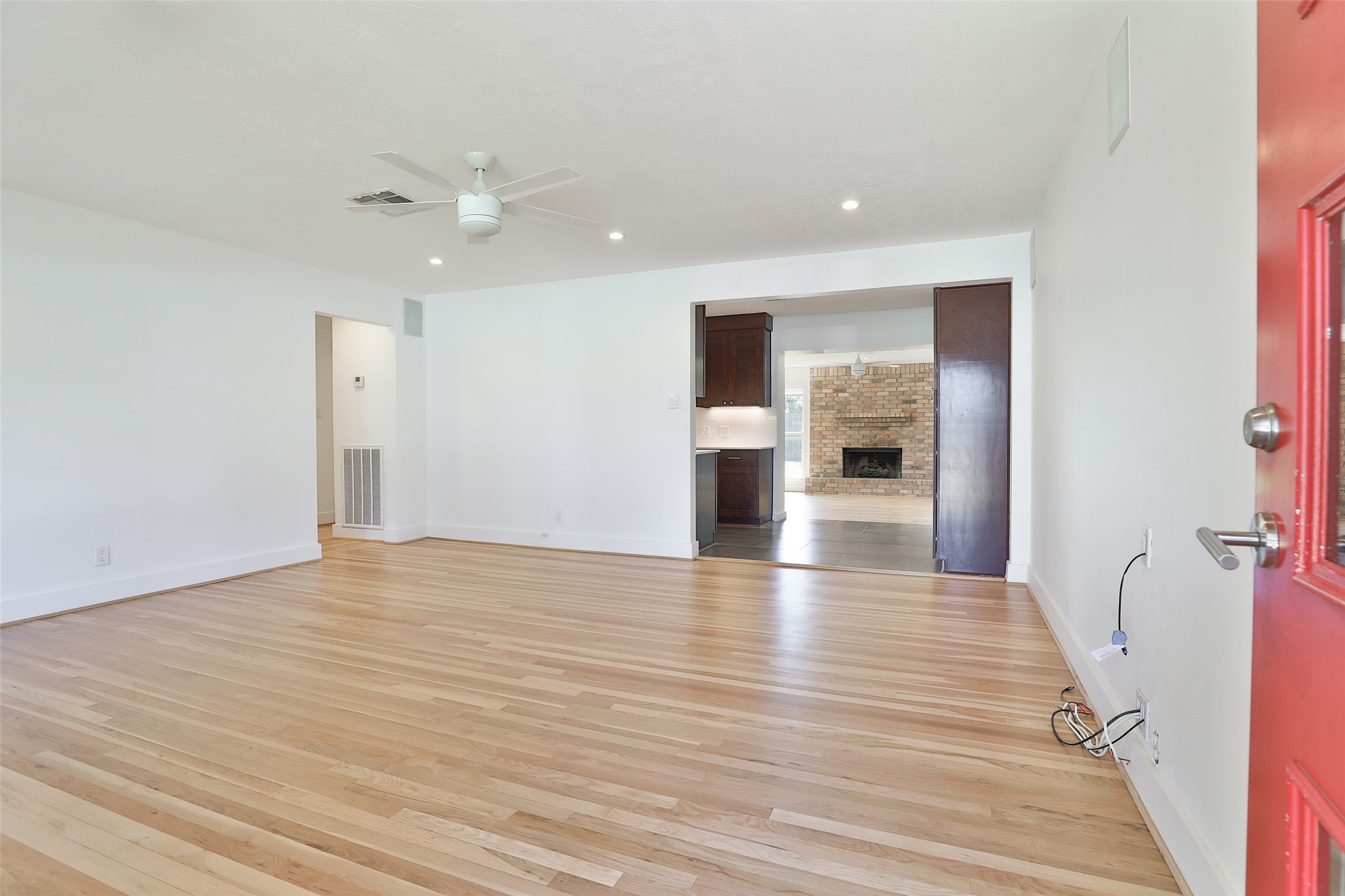 4613 Libbey Drive Houston, TX 77092 - Photo 3 of 26 a view of empty room with wooden floor