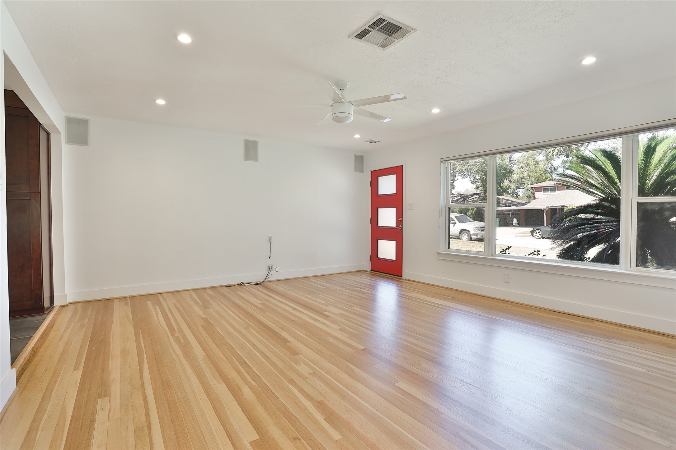 4613 Libbey Drive Houston, TX 77092 - Photo 5 of 26 wooden floor in an empty room with a window