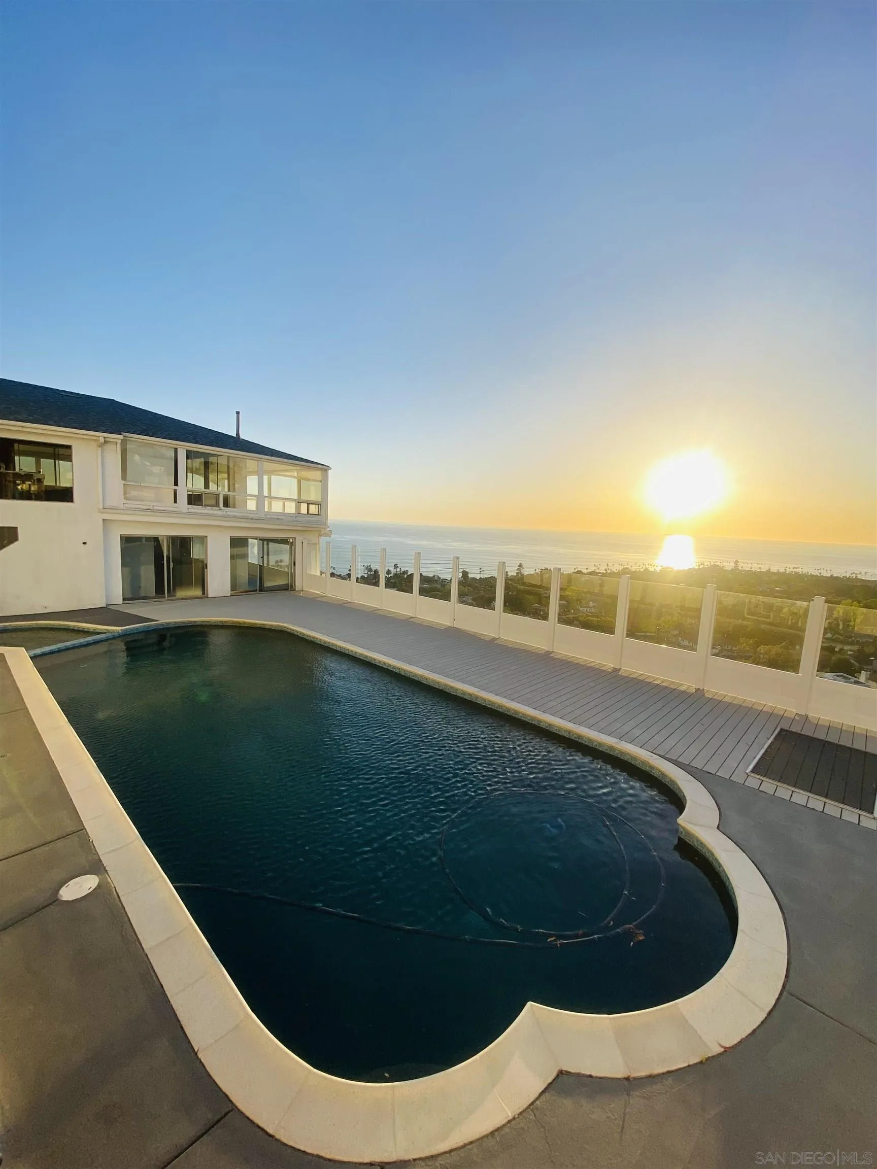 856 La Jolla Rancho Road La Jolla, CA 92037 - Photo 9 of 18 a view of a swimming pool with an outdoor space