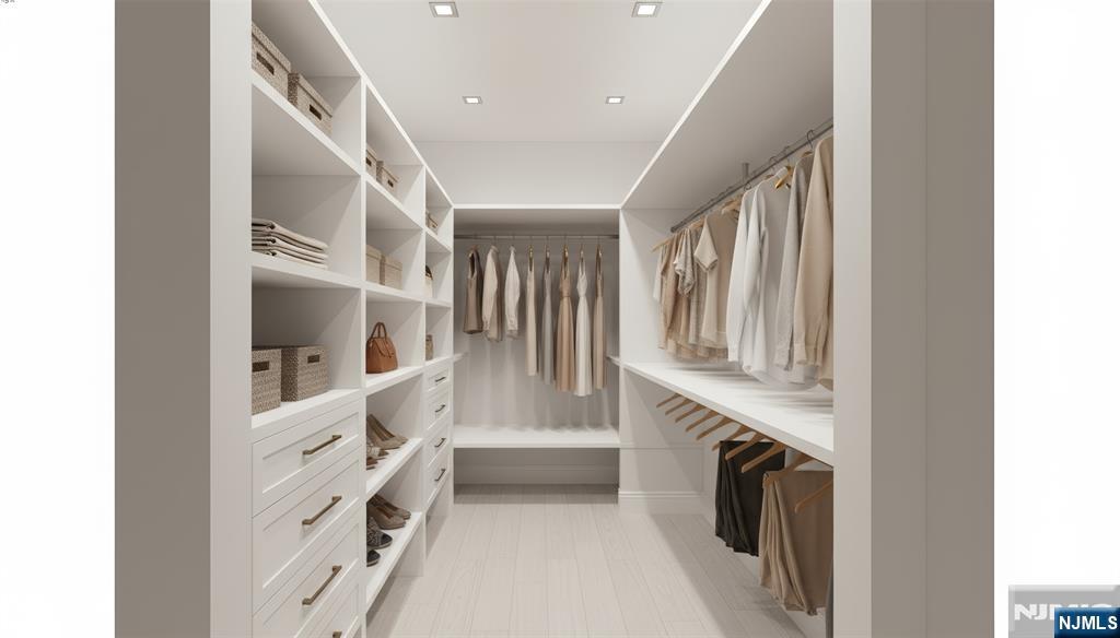 51 Brookside Terrace North Caldwell, NJ 07006 - Photo 12 of 12 a view of walk in closet with fireplace