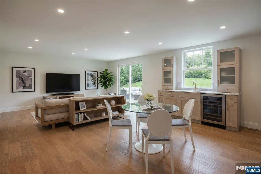 51 Brookside Terrace North Caldwell, NJ 07006 - Photo 4 of 12 a living room with furniture and a flat screen tv
