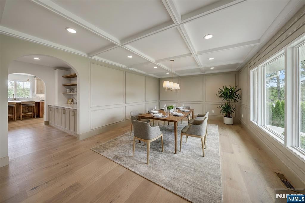 51 Brookside Terrace North Caldwell, NJ 07006 - Photo 7 of 12 a view of a dining room with furniture window and wooden floor