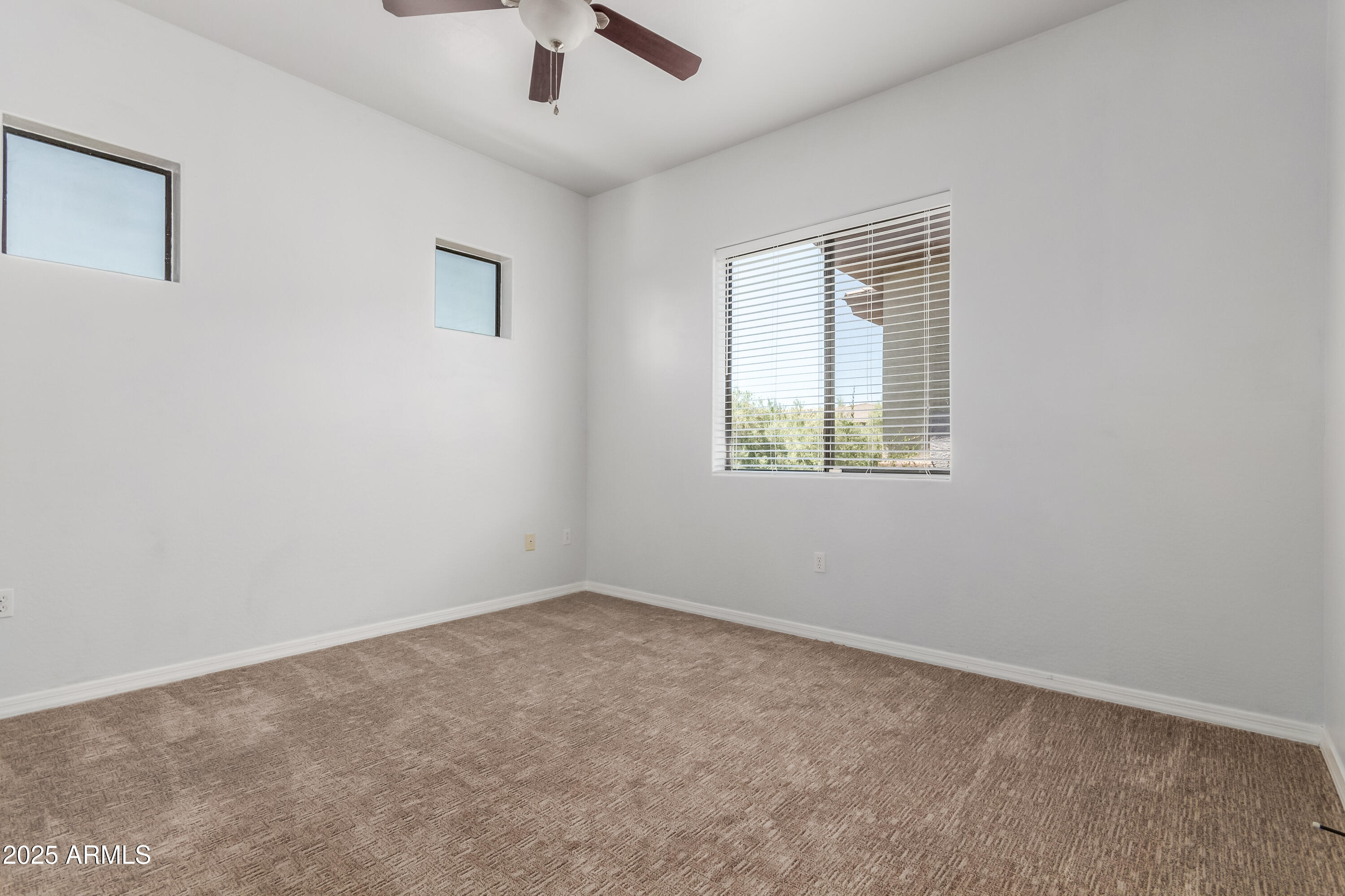 3330 South Gilbert Road, Unit 2018 Chandler, AZ 85286 - Photo 15 of 24 an empty room with a window
