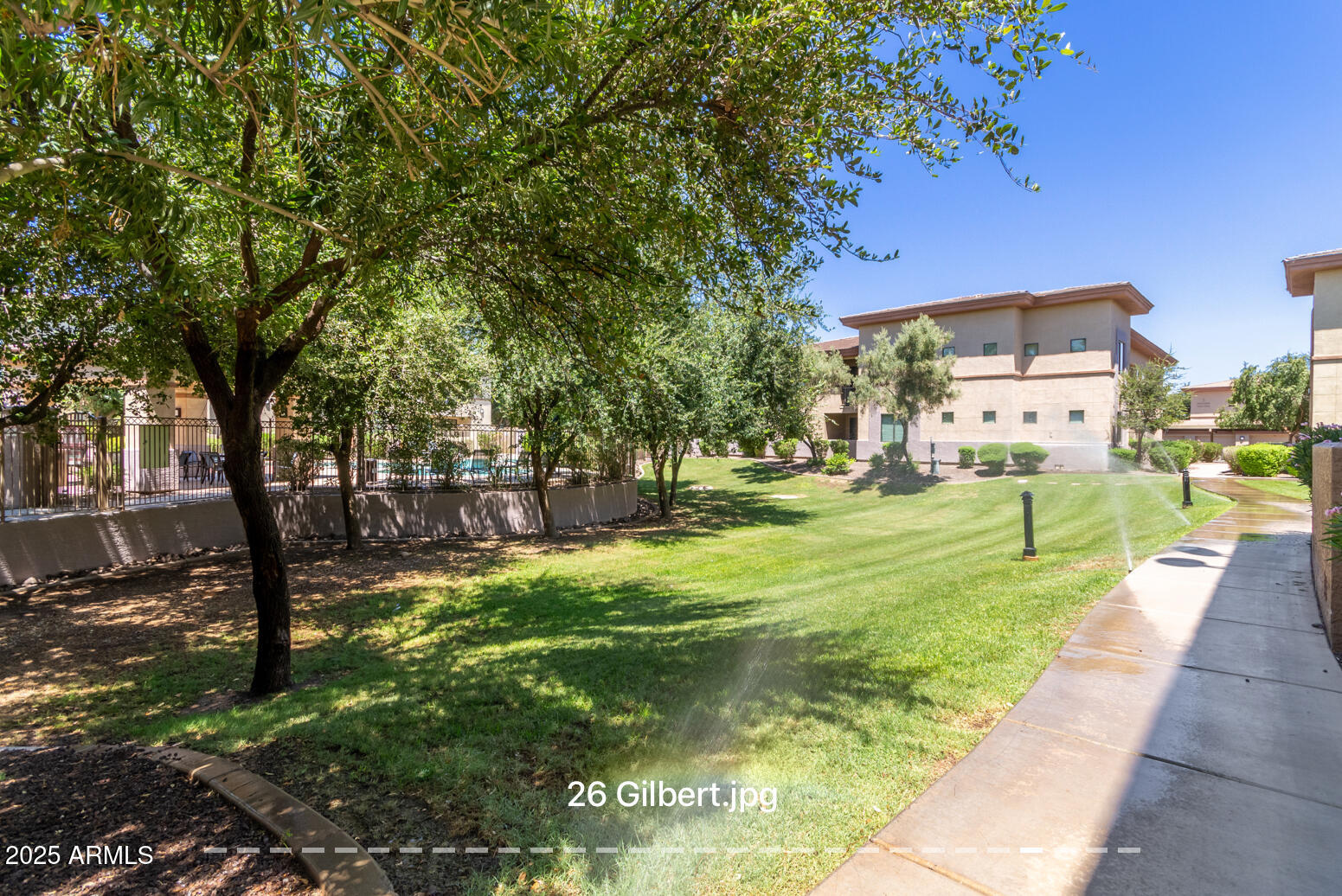 3330 South Gilbert Road, Unit 2018 Chandler, AZ 85286 - Photo 21 of 24 a view of a park with large trees