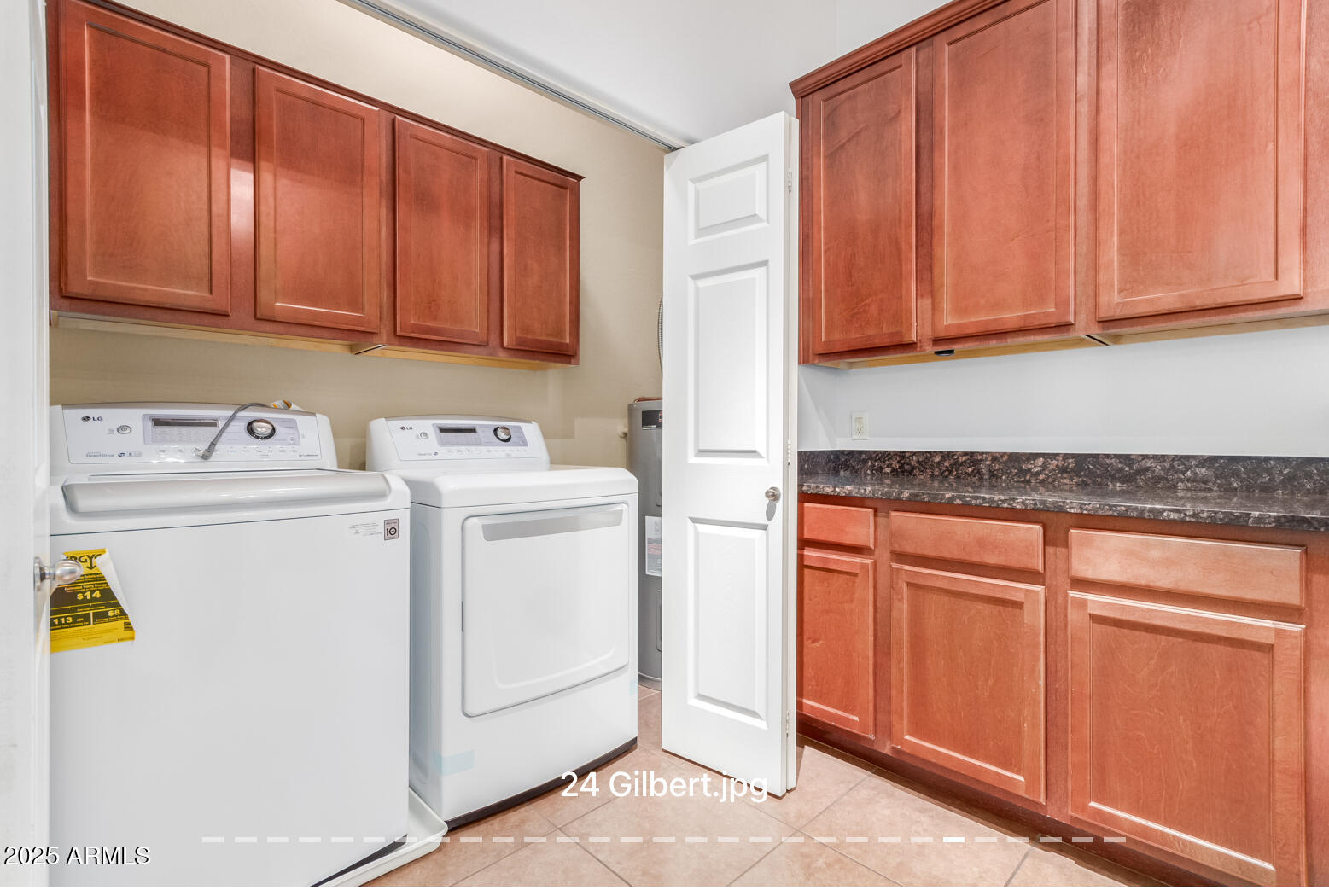 3330 South Gilbert Road, Unit 2018 Chandler, AZ 85286 - Photo 10 of 24 a utility room with dryer and washer