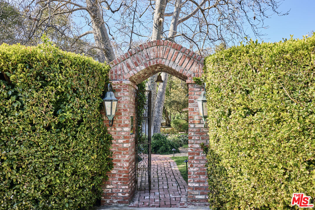 6138 Ramirez Canyon Road Malibu, CA 90265 - Photo 26 of 31 a view of a pathway of a building